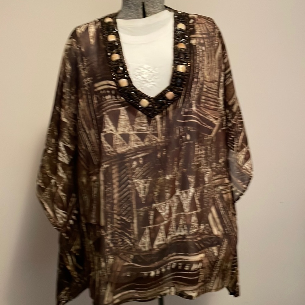 Top. Poncho style. Chico’s. Size L/XL. Brown multicolored. Excellent condition